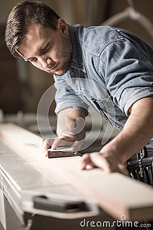 Skilled carpenter working Stock Photo