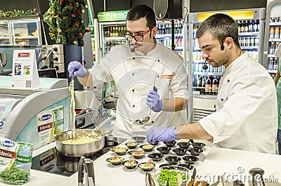 Skilled chefs have a cooking demonstration Editorial Stock Photo