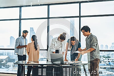 Skilled multicultural businesspeople in casual outfit working together. Tracery. Stock Photo