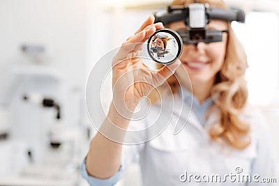 Skillful careful ophthalmologist making observations Stock Photo