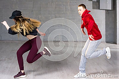 Skillful hip-hop dancers in movement. Stock Photo