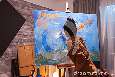 Skillful woman painter Stock Photo