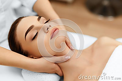 Skin, Body Care. Woman Getting Beauty Spa Face Massage. Treatment. Stock Photo