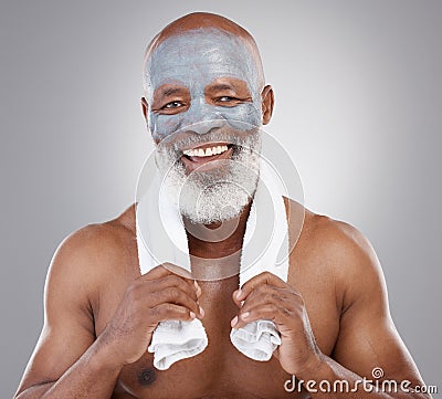 Skin care, cleansing face mask and portrait of black man with smile, happiness and anti ageing clay spa treatment Stock Photo