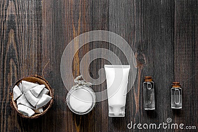 Skin care. Coconut oil, cream and lotion on wooden table background top view copyspace Stock Photo