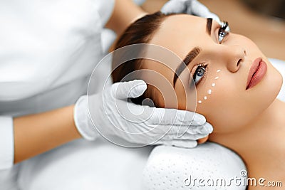 Skin Care. Cosmetic Cream On Woman's Face. Beauty Spa Treatment Stock Photo