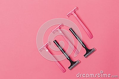 Skin Care Ideas. Flatlay Upper View Image of Five Colorful Pink and Black Disposable Razors Shavers Placed Reversed Over Trendy Stock Photo