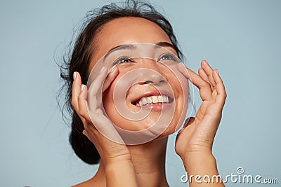 Skin care. Woman with beauty face touching facial skin portrait Stock Photo