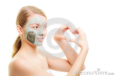 Skin care. Woman in clay mud mask on face. Beauty. Stock Photo