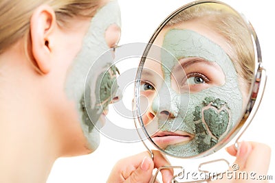 Skin care. Woman in clay mud mask on face. Beauty. Stock Photo