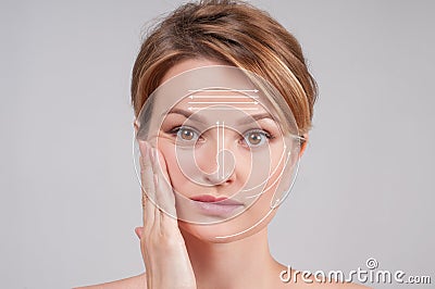 Skin Care. Woman with perfectly clean skin and massage facial lines Stock Photo