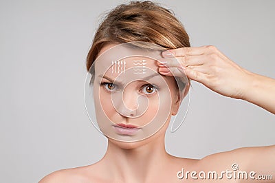 Skin Care. Woman with perfectly clean skin and massage facial lines Stock Photo