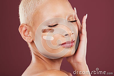 Skin foundation, makeup and face of woman with contour, cosmetics products and beauty on studio background. Cosmetology Stock Photo