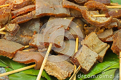 Skin sate satay closed up traditional food served in banana leaf Stock Photo