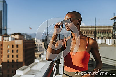 Skinhead girl at a LA rooftop Stock Photo