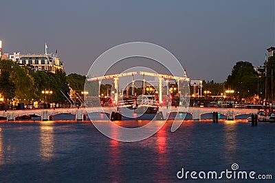 Skinny bridge amsterdam evening Stock Photo