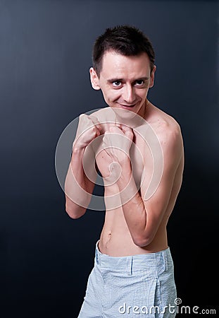 Skinny topless man. Stock Photo