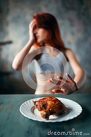 Skinny woman refuses to eat, anorexia Stock Photo