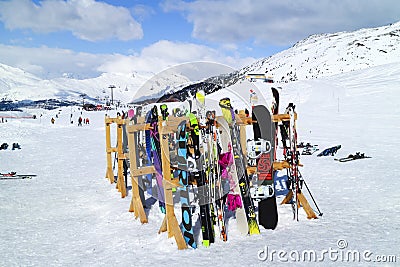 Skis and snowboards on alpine slopes Editorial Stock Photo