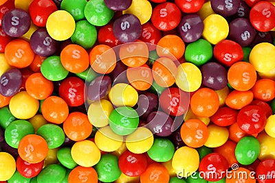 Skittles multicolored fruit candies background Editorial Stock Photo