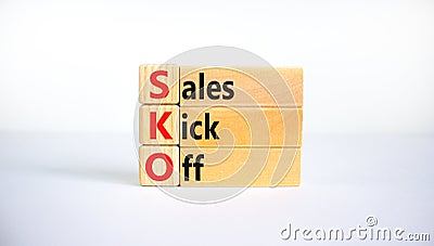 SKO sails kick off symbol. Concept words SKO sails kick off on wooden blocks. Beautiful white background, copy space. Business and Stock Photo