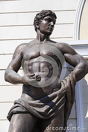 Male bronze sculpture in downtown Skopje Editorial Stock Photo