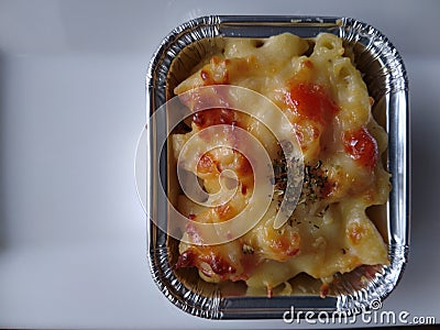 Skotel macaroni in a luminium foil box Stock Photo