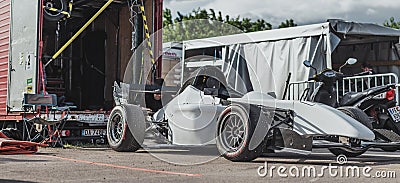 Skradin Croatia June 2020 Amateur black and white formula parked in the race paddock after a race, in process of being Editorial Stock Photo