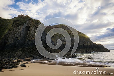 Skrinkle Sandstones Group pembrokeshire south wales at dawn Stock Photo