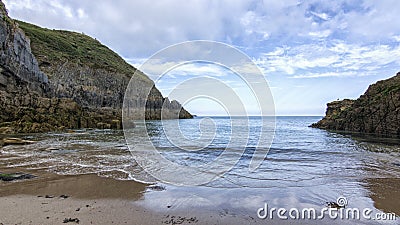 Skrinkle Sandstones Group pembrokeshire south wales at dawn Stock Photo