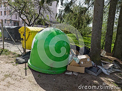 Skrunda, Latvia - May 13, 2022: Different colored trash cans in the park. Separate trash, sort waste to be recycled again. Editorial Stock Photo