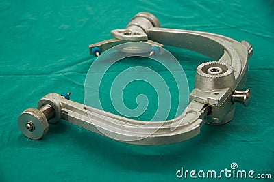 Skull clamp with pins for head fixation in operating room Stock Photo