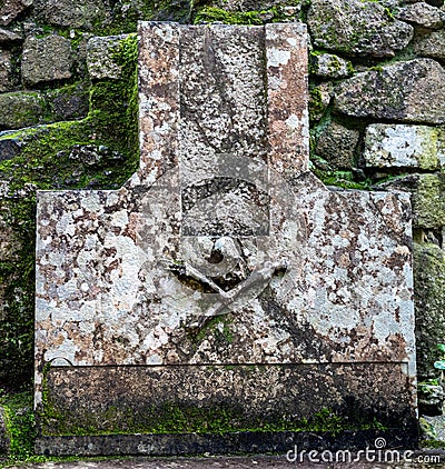 Skull and Cross Bones on a Headstone in the Moorish Castle at Sintra Stock Photo