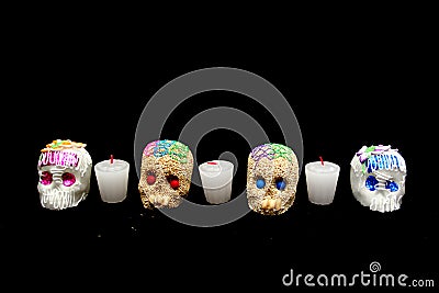 Candy in the shape of a skull made of sugar and amaranth to decorate the offering with candles for the Day of the Faithful Dead an Stock Photo