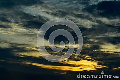 Sky and black clouds on the day of thunderstorms. Shines orange on the clouds Stock Photo