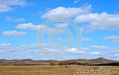Sky and cloud above field and hills Stock Photo