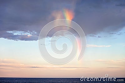 Sky clouds texture with rainbow, background. Dramatic sky cloud Stock Photo