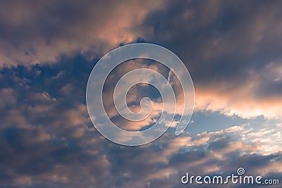 Sky, clouds tinged with pink at sunset Stock Photo