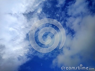 Sky in cloudy whether where slite sun is present Stock Photo