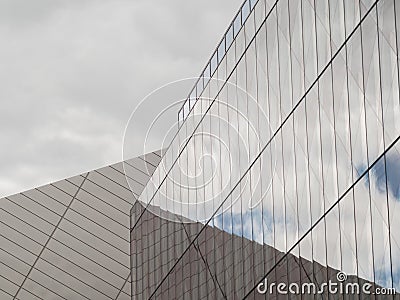 Sky reflected in glass of modern glass steel office building in Dublin, Ireland. Editorial Stock Photo