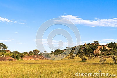 Sky and rocks on endless plain of Serengeti. Tanzania, Africa Stock Photo