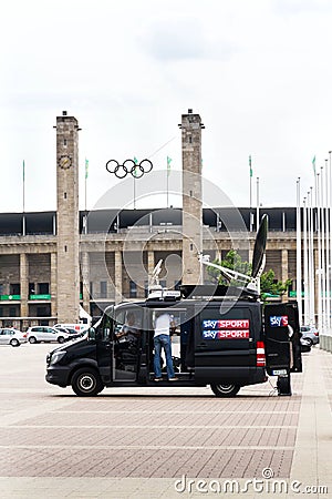 Sky Sports television production truck stands in front of Olympic stadiumin Berlin, Germany Editorial Stock Photo