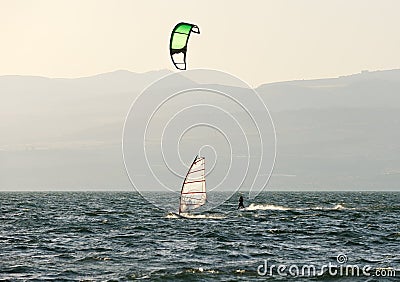 Sky-surfing and surfing on lake Kinneret Stock Photo