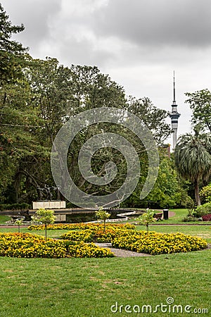 Sky tower and Three Witches Statue in Auckland. Stock Photo