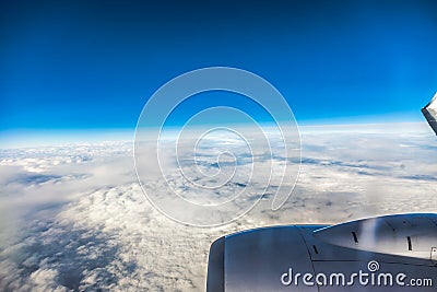 Sky. View from window of airplane flying in clouds Stock Photo