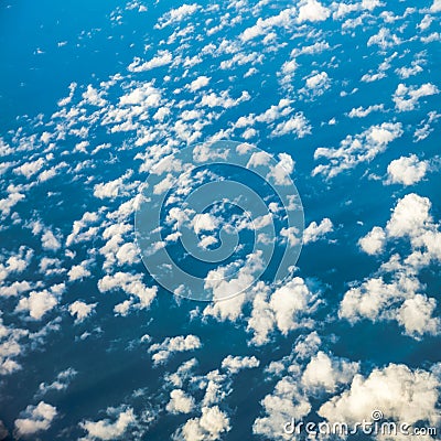 Sky. View from window of airplane flying in clouds Stock Photo