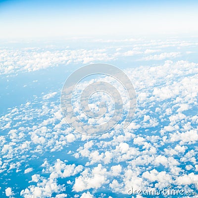 Sky. View from window of airplane flying in clouds Stock Photo