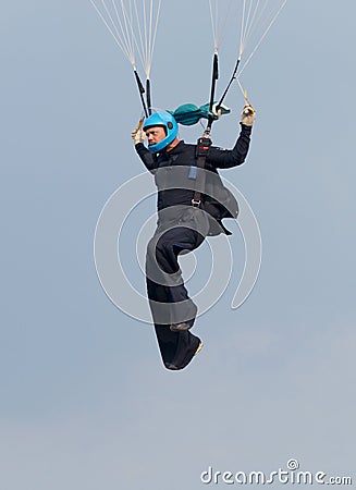 Skydiver hanging from parachute focusing and aiming for perfect Editorial Stock Photo