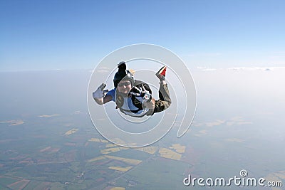 Skydiver waves at the cameraman Stock Photo