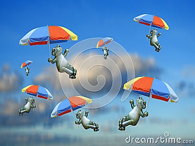 Skyfall frogs singing in the rain umbrellas Stock Photo